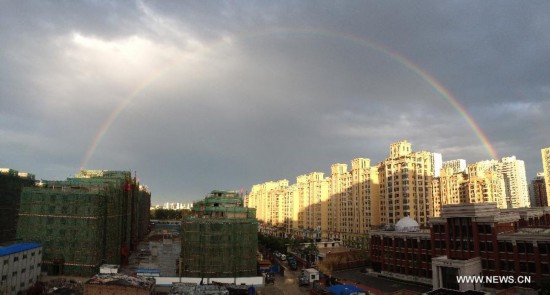 Rainbow appears after hours of rainfalls in Beijing, capital of China, June 6, 2014.