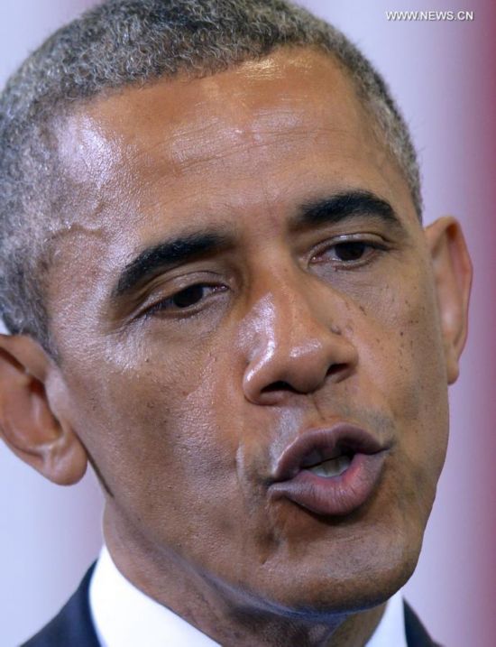 U.S. President Barack Obama speaks at the Walker Jones Education Campus in Washington D.C., the United States, on July 21, 2014. U.S. President Barack Obama on Monday called for a full, unimpeded and transparent investigation into the crash of Malaysian airliner MH17 in Ukraine.