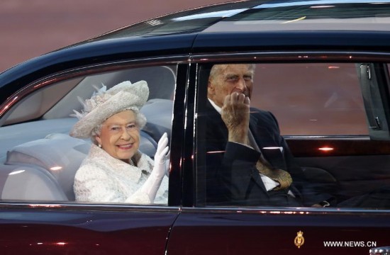 Britain's Queen Elizabeth II and Prince Philip, Duke of Edinburgh, arrive for the opening ceremony of the XX Commonwealth Games at the Celtic Park in Glasgow July 23, 2014.