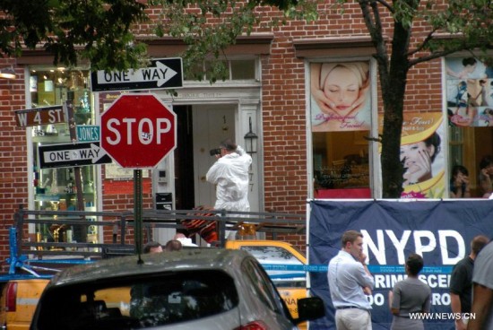 Two deputy U.S. marshals and a NYPD detective were injured by gunshots when they were trying to arrest a fugitive who was finally shot dead in the exchange of fire with police at a smoke shop in the West Village on Monday.