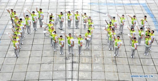 Volunteers line for Nanjing 2014 Youth Olympic Games 