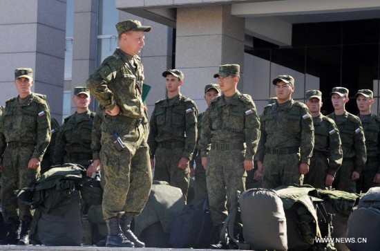 The first Russian army echelon on Saturday arrived at the Zhurihe training base, where 'Peace Mission-2014,' a drill under the Shanghai Cooperation Organization (SCO) framework, will run from Aug. 24-29. The drill, which will involve over 7,000 personnel from China, Russia, Kazakhstan, Kyrgyzstan and Tajikistan, is expected to hone multilateral decision-making, sharpen joint anti-terror efforts and boost intelligence sharing to ensure regional peace and stability.