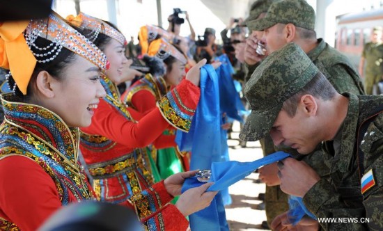 The first Russian army echelon on Saturday arrived at the Zhurihe training base, where 'Peace Mission-2014,' a drill under the Shanghai Cooperation Organization (SCO) framework, will run from Aug. 24-29. The drill, which will involve over 7,000 personnel from China, Russia, Kazakhstan, Kyrgyzstan and Tajikistan, is expected to hone multilateral decision-making, sharpen joint anti-terror efforts and boost intelligence sharing to ensure regional peace and stability.