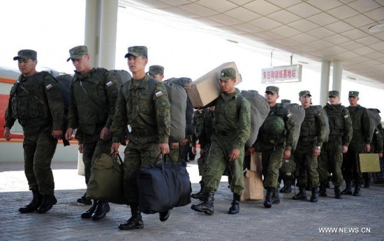 The first Russian army echelon on Saturday arrived at the Zhurihe training base, where 'Peace Mission-2014,' a drill under the Shanghai Cooperation Organization (SCO) framework, will run from Aug. 24-29. The drill, which will involve over 7,000 personnel from China, Russia, Kazakhstan, Kyrgyzstan and Tajikistan, is expected to hone multilateral decision-making, sharpen joint anti-terror efforts and boost intelligence sharing to ensure regional peace and stability.