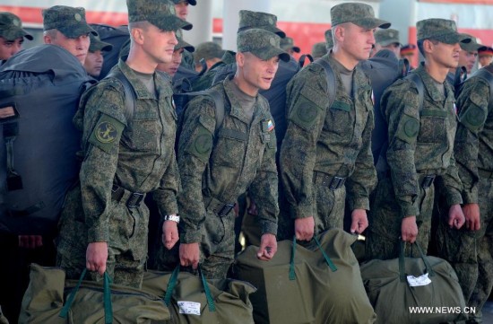 The first Russian army echelon on Saturday arrived at the Zhurihe training base, where 'Peace Mission-2014,' a drill under the Shanghai Cooperation Organization (SCO) framework, will run from Aug. 24-29. The drill, which will involve over 7,000 personnel from China, Russia, Kazakhstan, Kyrgyzstan and Tajikistan, is expected to hone multilateral decision-making, sharpen joint anti-terror efforts and boost intelligence sharing to ensure regional peace and stability.