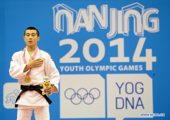 Bauyrzhan Zhauyntayev of Kazakhstan poses after Men -55 kg of Judo event of Nanjing 2014 Youth Olympic Games