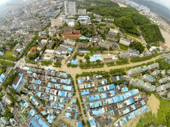 Rain-triggered flood hits China's Lishui City