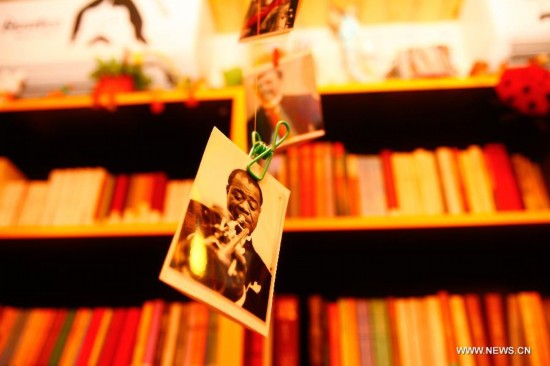 Photo taken on Aug. 27, 2014 shows the interior of a bookstore at the Chilanqiao cultural block on Shuguangbei Street in Heifei, capital of east China's Anhui Province. The cultural block, used to be a hub for junk dealers, has become a favorite destination for artists and culture lovers with its bookstores, galleries, bars and coffee houses and hostels after its reconstruction starting in 2012. (Xinhua/Zhu Weixi)