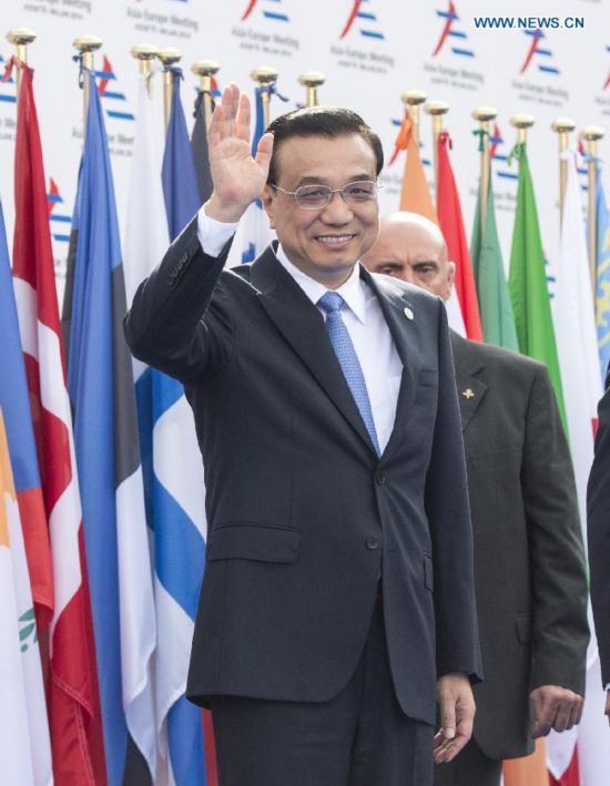 Chinese Premier Li Keqiang arrives for the opening of the tenth Asia-Europe Meeting (ASEM) in Milan, Italy, Oct. 16, 2014.