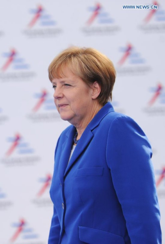 German Chanceller Angela Merkel arrives for the Asia-Europe Meeting (ASEM) in Milan, Italy on October 16,2014. The tenth Asia-Europe Meeting (ASEM) opened in Milan on Thursday under the theme of 'Responsible Partnership for Growth and Security.'