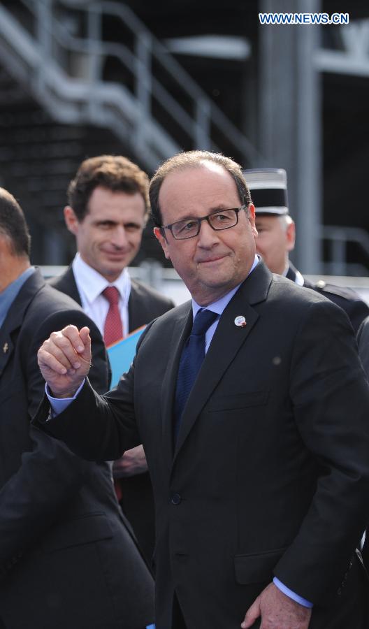 French president Francois Hollande arrives for the Asia-Europe Meeting (ASEM) in Milan, Italy on October 16,2014. The tenth Asia-Europe Meeting (ASEM) opened in Milan on Thursday under the theme of 'Responsible Partnership for Growth and Security.'