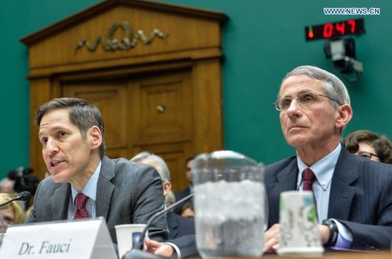 Tom Frieden(L), the director of the U.S. Centers for Disease Control and Prevention (CDC) testifies during a hearing on Examining the U.S. Public Health Response to the Ebola Outbreak before the Oversight and Investigations Subcommittee at Capitol Hill in Washington D.C., capital of the United States, Oct. 16, 2014. A hospital in Texas where an Ebola patient died and two nurses were infected apologized Thursday for mishandling the deadly disease, as the National Institutes of Health (NIH) prepared to treat the first nurse who contracted the virus while caring for the deceased.