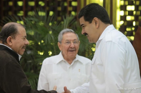 Venezuelan President Nicolas Maduro(R) shakes hands with Nicaraguan President Daniel Ortega(L) during the extraordinary Summit of the Bolivarian Alliance for the Peoples of Our America (ALBA), in Havana, Cuba, on Oct. 20, 2014.