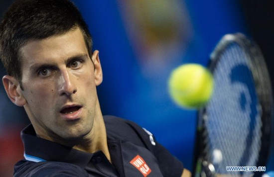 Novak Djokovic of Serbia returns the ball during the men's singles third round match against Fernando Verdasco of Spain at the 2015 Australian Open tennis tournament at Melbourne Park in Melbourne, Australia, Jan. 24, 2015. Djokovic won 3-0. (Xinhua/Bai Xue) 