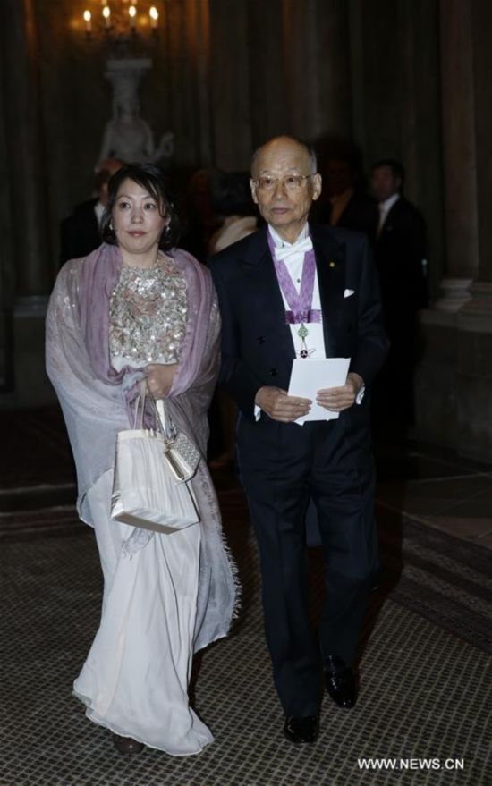 Nobel Prize in Physiology or Medicine 2015 laureate, Japanese biochemist Satoshi Omura (R), attends the royal banquet for Nobel laureates at Royal Palace in Stockholm, Sweden, Dec. 11, 2015. 