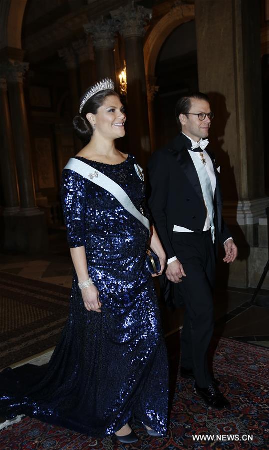 Sweden's Crown Princess Victoria and her husband Prince Daniel attend the royal banquet for Nobel laureates at Royal Palace in Stockholm, Sweden, Dec. 11, 2015.