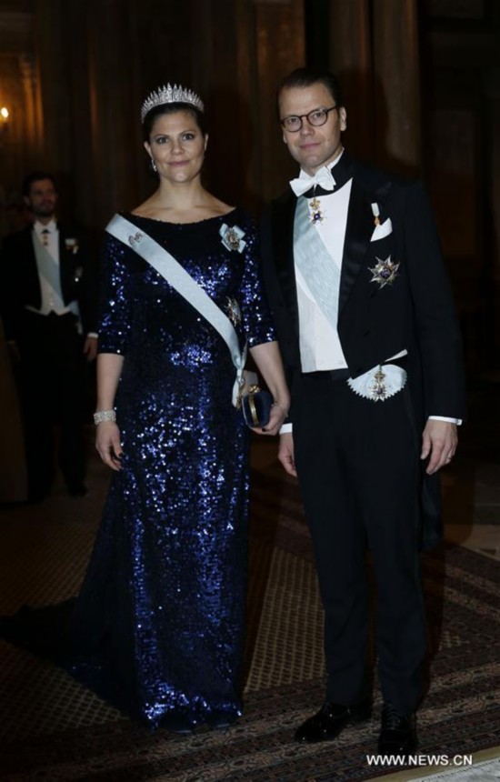 Sweden's Crown Princess Victoria and her husband Prince Daniel attend the royal banquet for Nobel laureates at Royal Palace in Stockholm, Sweden, Dec. 11, 2015.