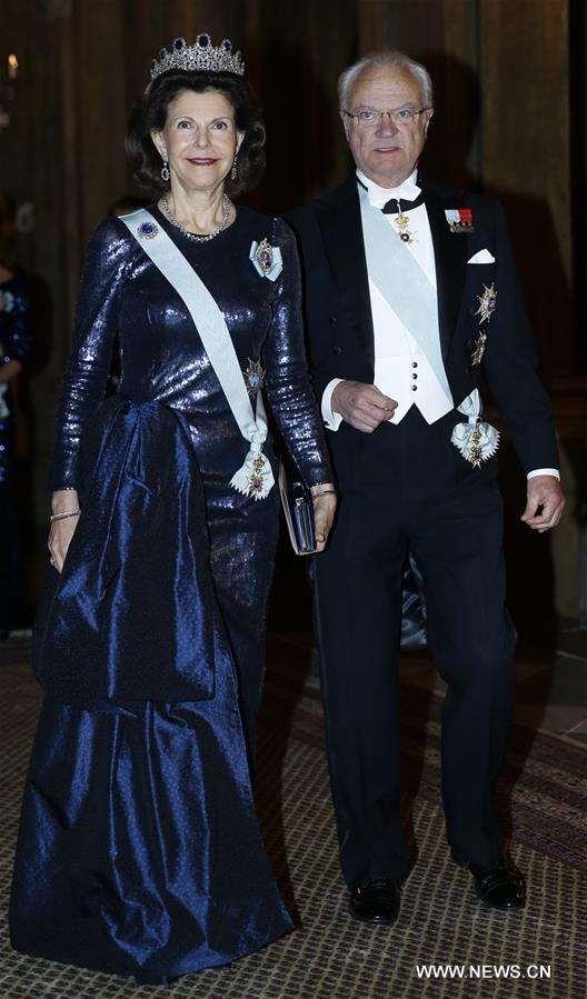 Sweden's King Carl XVI Gustaf and Queen Silvia attend the royal banquet for Nobel laureates at Royal Palace in Stockholm, Sweden, Dec. 11, 2015.