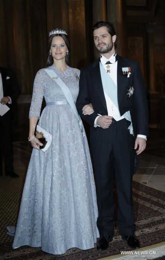 Sweden's Prince Carl Philip and his wife Princess Sofia attend the royal banquet for Nobel laureates at Royal Palace in Stockholm, Sweden, Dec. 11, 2015.