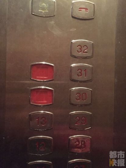 西安一小区电梯按钮混乱 关门键竟是报警键(图)