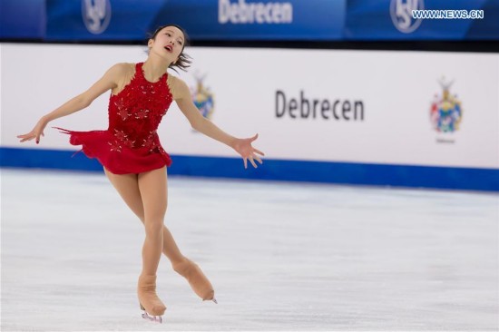 Gold medalist Marin Honda of Japan competes during the women's figure skating during the ISU World Junior Figure Skating Championships in Debrecen, Hungary, March 19, 2016.