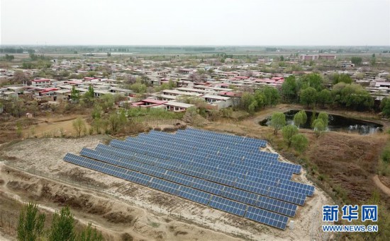 闲置荒地建光伏 电站入村探新路