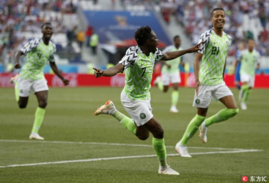 Nigeria's Ahmed Musa, centre, celebrates after scoring his team's first goal during the group D match between Nigeria and Iceland at the 2018 soccer World Cup in the Volgograd Arena in Volgograd, Russia,June 22, 2018. [Photo: IC]