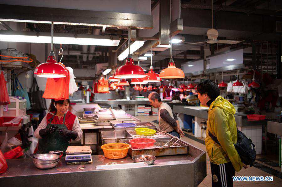 Pic story: local fishmonger witnesses great changes in Macao in past 20 years