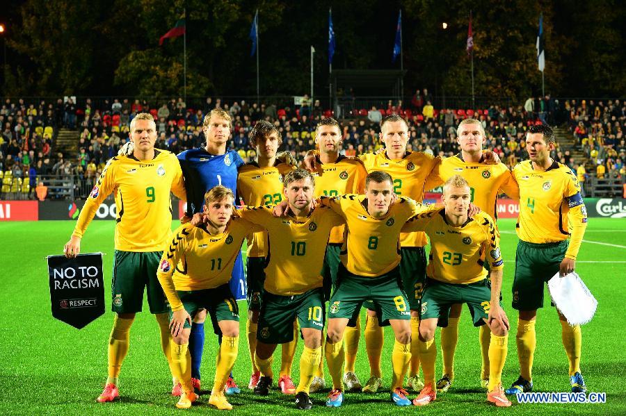 Lithuania's players pose prior to the Euro 2016 Qualifier football match against Estonia in Vilnius, Lithuania, on Oct. 9, 2014. Lithuanians won 1-0. 