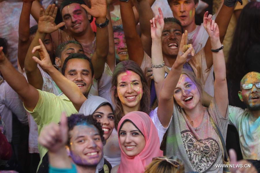 Egyptians participate in the Festival of Colors in Cairo, capital of Egypt, Oct.16, 2014. 