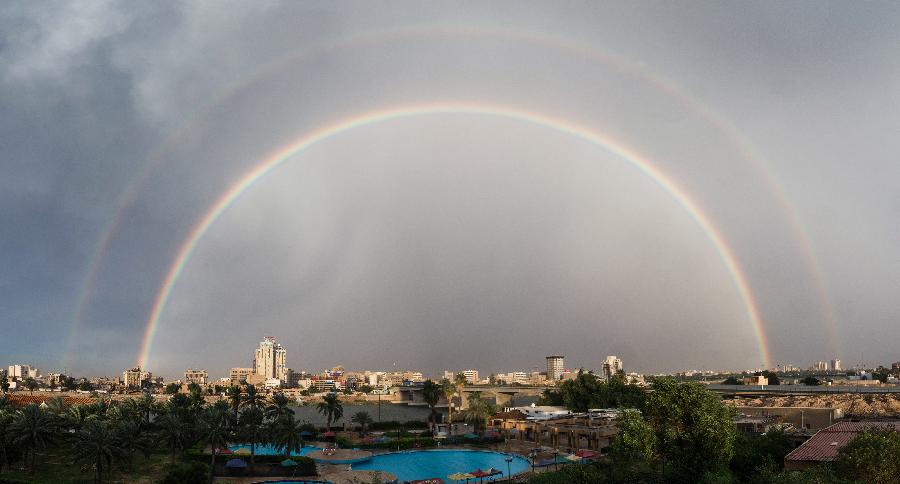 Double rainbows hang over the Tigris River in Baghdad, capital of Iraq, October 15, 2014. (Xinhua/Chen Xu)