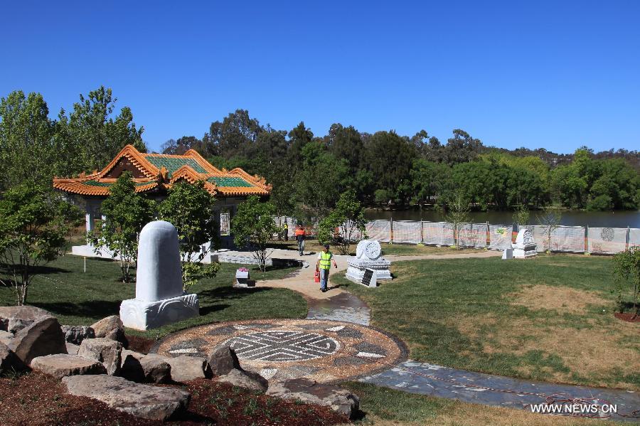 Gardeners work at the final touches of Beijing Garden in Canberra, Australia, Oct. 18, 2014. 