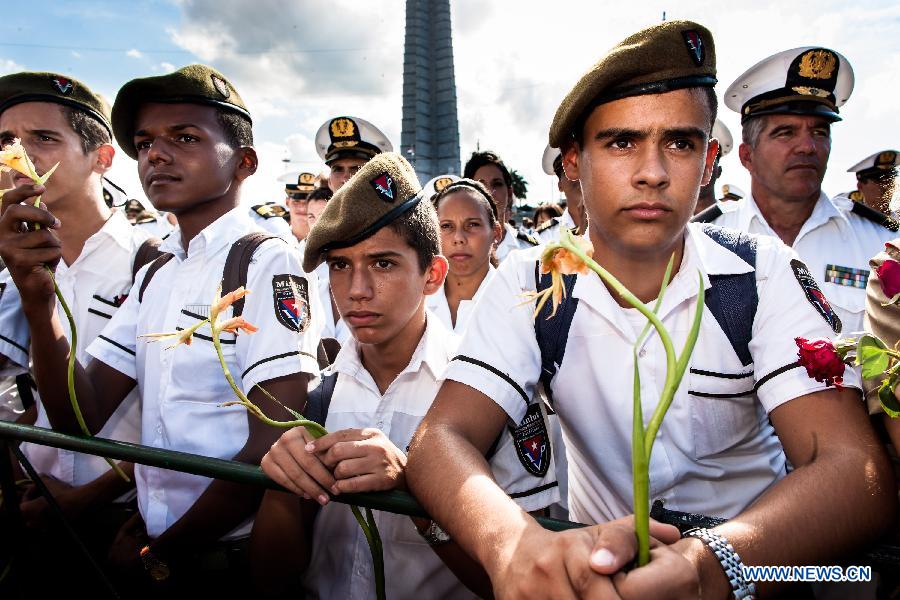 Militay school cadets take part in a ceremny commemorating Camilo Cienfuegos in Havana, capital of Cuba, on Oct. 28, 2014.