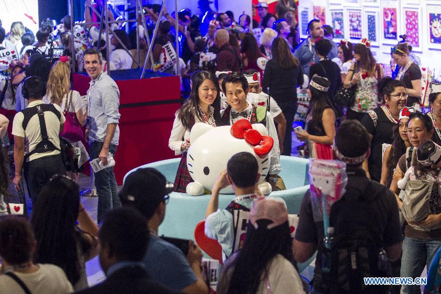 Fans attend the Hello Kitty Con, the first-ever Hello Kitty fan convention, in Los Angeles, the United States, Oct. 30, 2014.