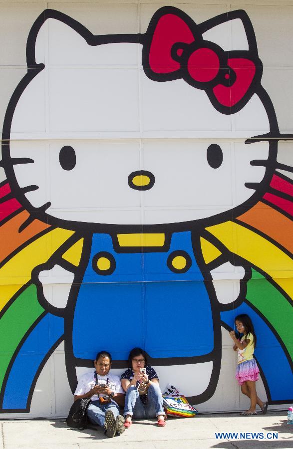 Fans take a rest at the Hello Kitty Con, the first-ever Hello Kitty fan convention, in Los Angeles, the United States, Oct. 30, 2014. 