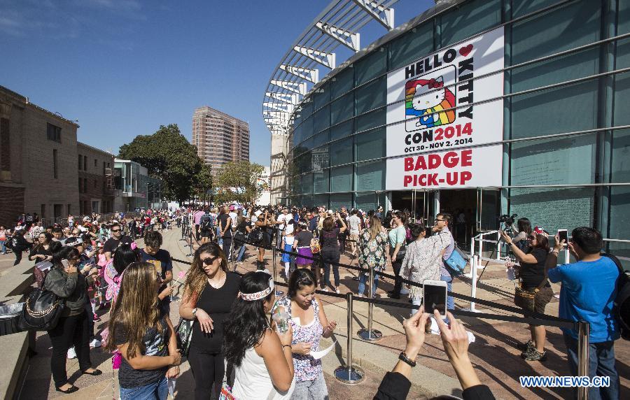 Fans wait to attend the Hello Kitty Con, the first-ever Hello Kitty fan convention, in Los Angeles, the United States, Oct. 30, 2014. 