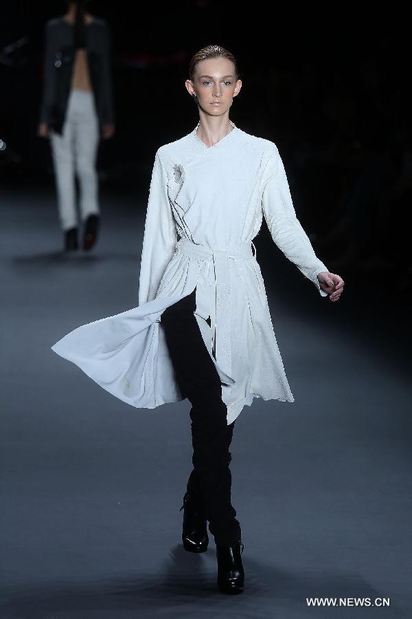 A model presents a creation of the winter collection of 'Uma Raquel Davidowicz' 2015 during the 38th Sao Paulo Fashion Week (SPFW), in Sao Paulo, Brazil, on Nov. 3, 2014.