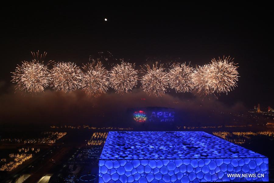 Fireworks explode in the sky over the Olympic Park in Beijing, China, Nov. 10, 2014.