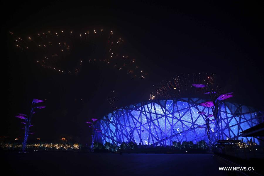 Fireworks explode in the sky over the Olympic Park in Beijing, China, Nov. 10, 2014.