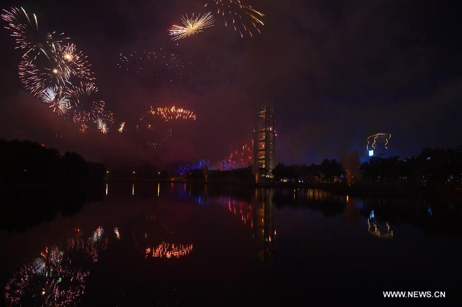 Fireworks explode in the sky over the Olympic Park in Beijing, China, Nov. 10, 2014.