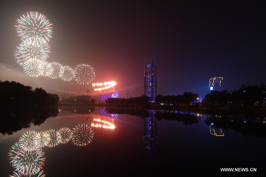 Fireworks explode in the sky over the Olympic Park in Beijing, China, Nov. 10, 2014.