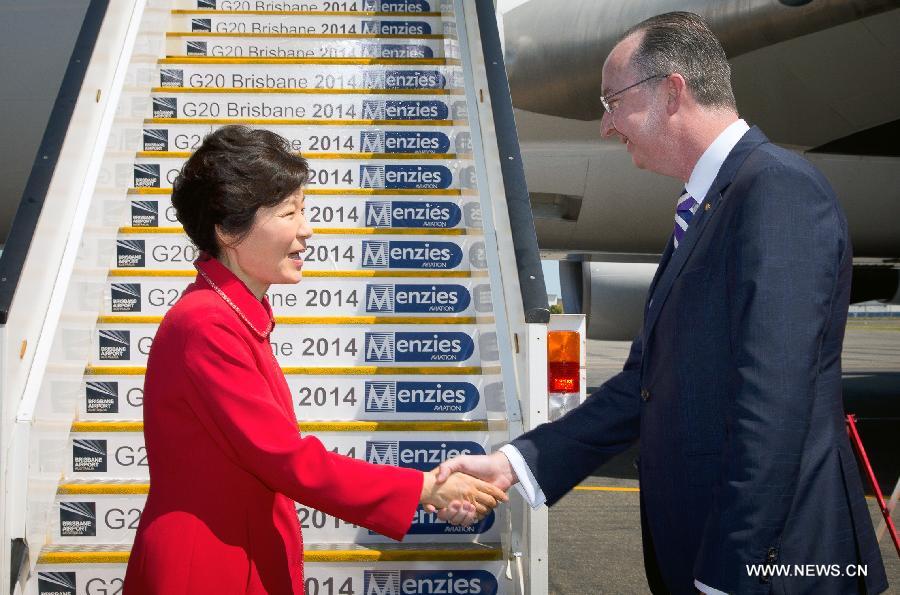 South Korean President Park Geun-hye (L) arrives in Brisbane of Australia to attend the G20 summit on Nov. 14, 2014. 