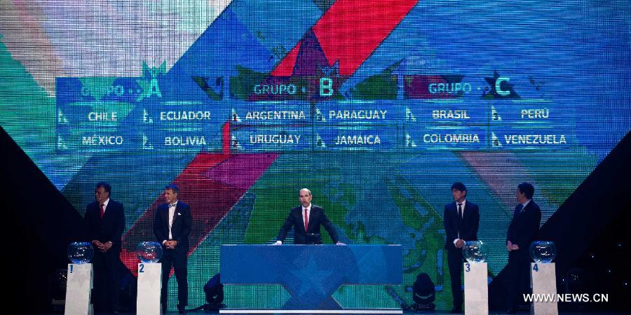 Sergio Jadue (C), president of Chile's Football Federation, announces the members of the groups during the official draw of the Copa America Chile 2015, in Vina del Mar, Chile, on Nov. 24, 2014.