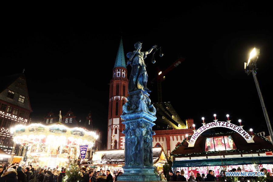 Photo taken on Nov. 26, 2014 shows the general view of the Christmas market after its official opening in Frankfurt, Germany.