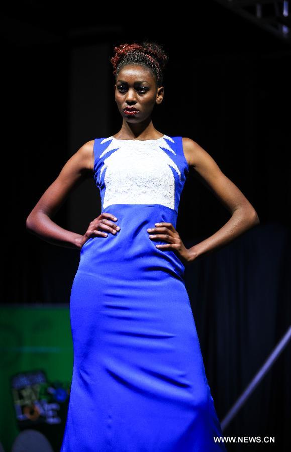A model presents a fashion creation of designer Haikaruwa during the 2014 Nairobi Fashion Week in Nairobi, capital of Kenya, Nov. 30, 2014. 