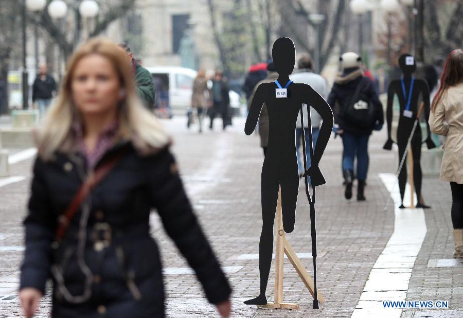 Art installments depicting disabled people are seen on the street of Banja Luka, Bosnia and Herzegovina, on Dec. 3, 2014. The International Day of People with Disability is observed on Wednesday to promote an understanding of disability issues and mobilize support for the dignity, rights and well-being of persons with disabilities.