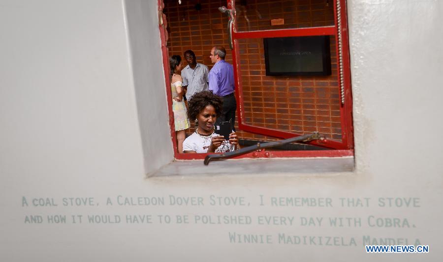 Photo taken on Dec. 4, 2014 shows the visitors at the Nelson Mandela National Museum in Soweto, southwest of Johannesburg, South Africa. 