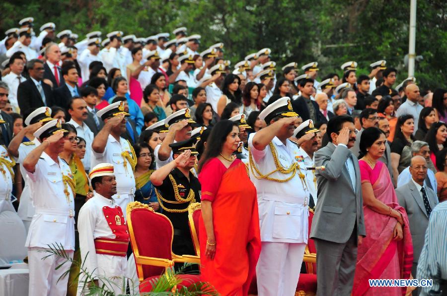 Indian Navy soldiers perform on the Navy Day celebration in Mumbai, India, Dec. 4, 2014. 