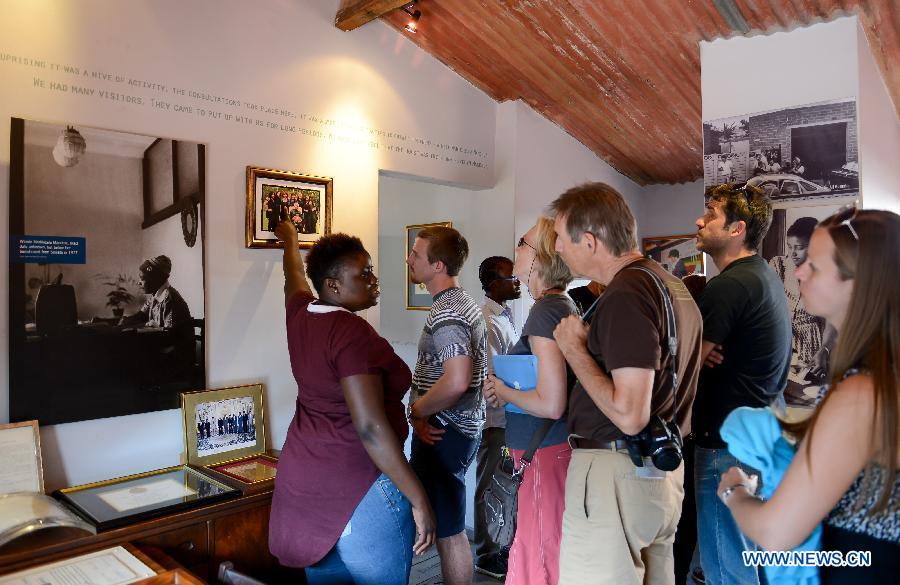 Photo taken on Dec. 4, 2014 shows the visitors at the Nelson Mandela National Museum in Soweto, southwest of Johannesburg, South Africa. 