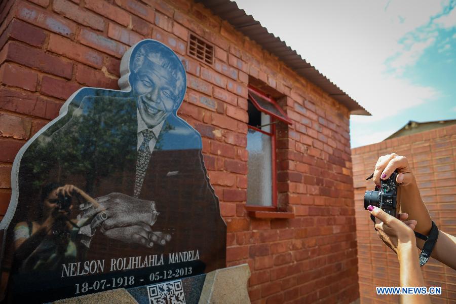 Photo taken on Dec. 4, 2014 shows the visitors at the Nelson Mandela National Museum in Soweto, southwest of Johannesburg, South Africa. 